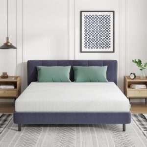 Hochwertiges Bett mit Matratze und grünem Kissen im modernen Schlafzimmer, stilvolle Einrichtung, entspannte Atmosphäre, perfekte Basis für erholsamen Schlaf.
